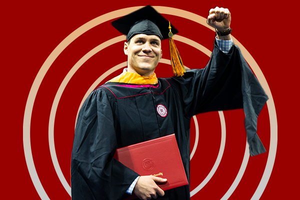 IU South Bend student at commencement in front of a gradient circle